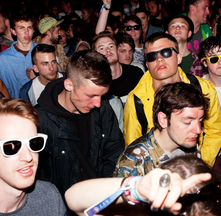 Crowd enjoying live music at a grassroots venue